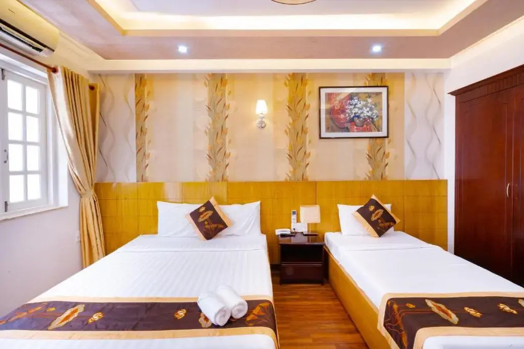 Saigon Amigo Hotel - Chambres