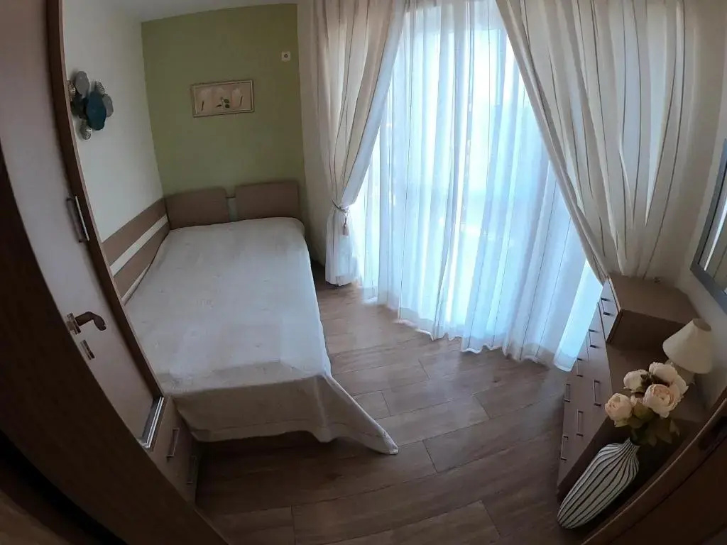 Aquaria Holiday Apartments - Chambres