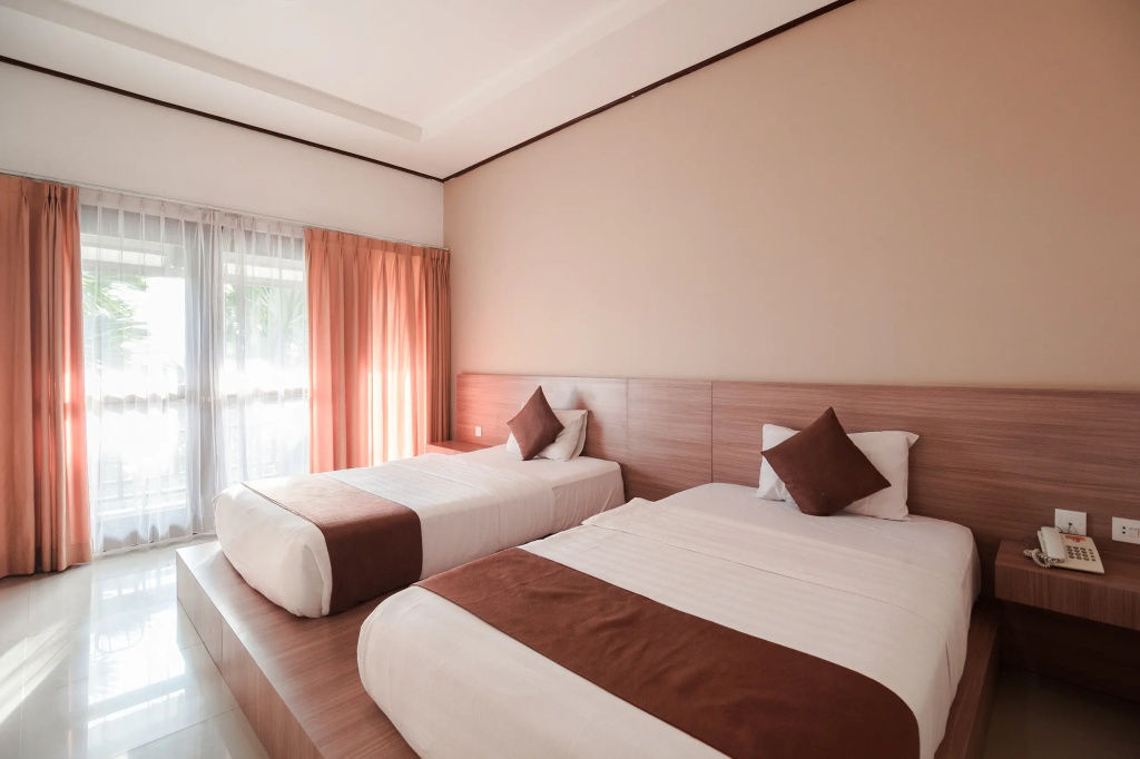 Surya Kencana Seaside Hotel - Chambres