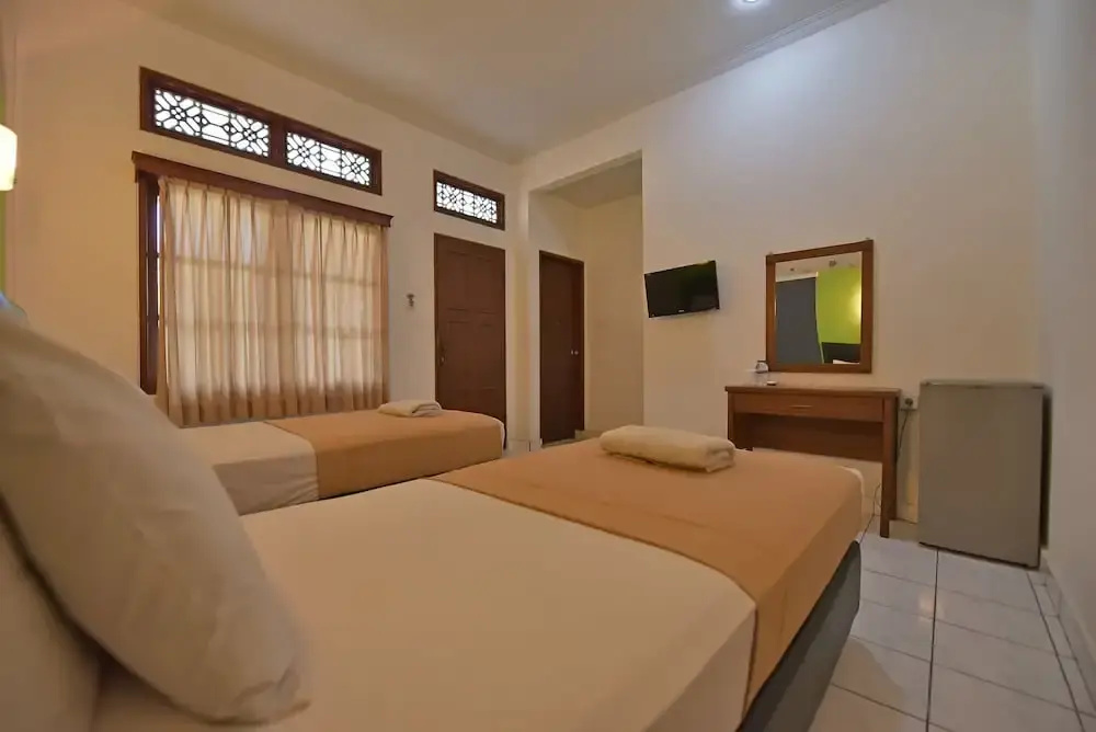 Sandat Hotel Kuta - Chambres