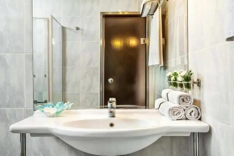 Minerva Premier Hotel - Chambres