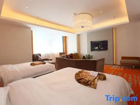 Shuangman International Hotel - Chambres