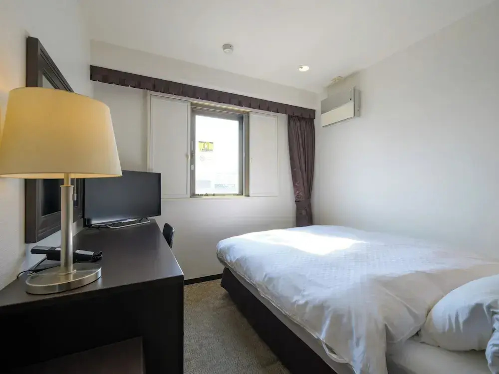 Centre One Hotel Handa - Chambres