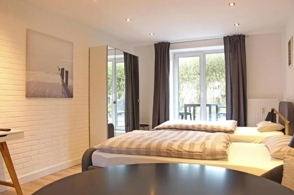 Moderne 1-Zimmer Wohnung mit Terasse, Küche, Bad mit Dusche, TV & WIFI - фото 3