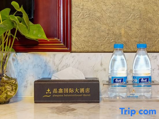 Jingxin International Hotel - Chambres