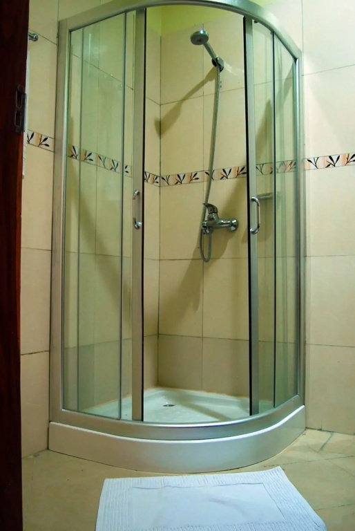 Mvuli Hotel - Chambres