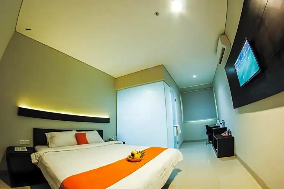 Alpha Hotel - Chambres