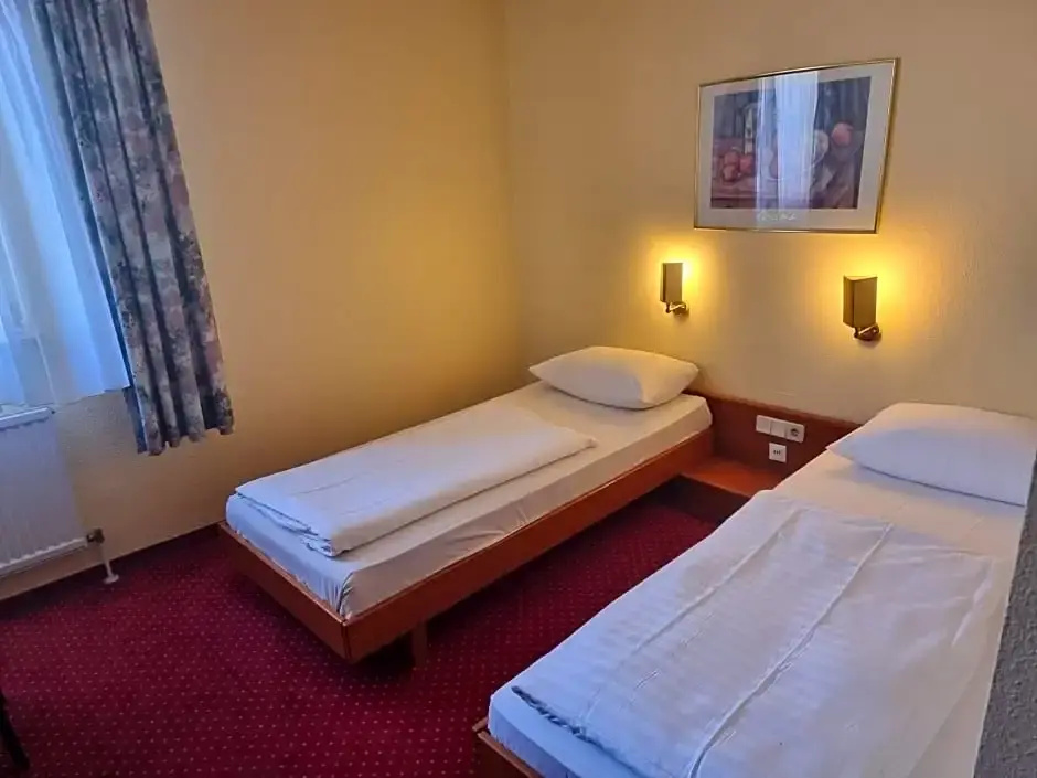 Hotel Mondial - Chambres