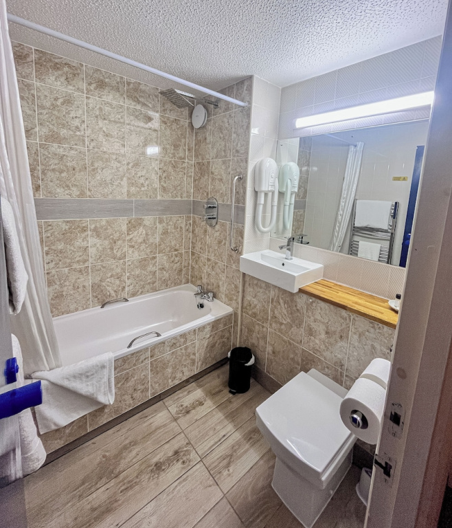 Travel Plaza Hotel - Chambres