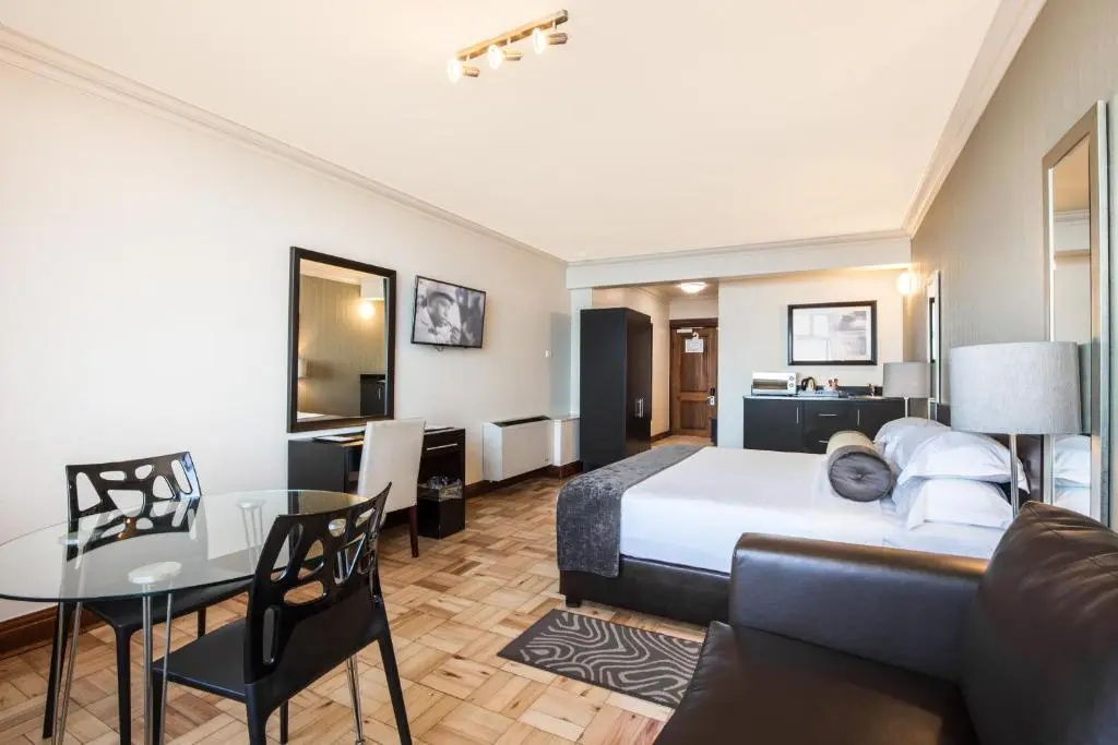 Belaire Suites - Chambres
