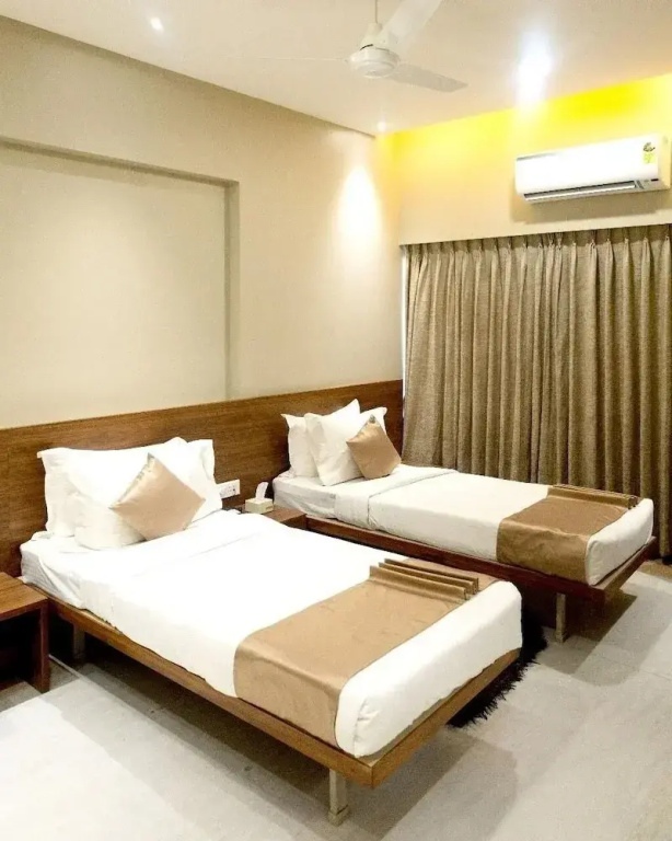 Hotel Ambience Excellency - Chambres