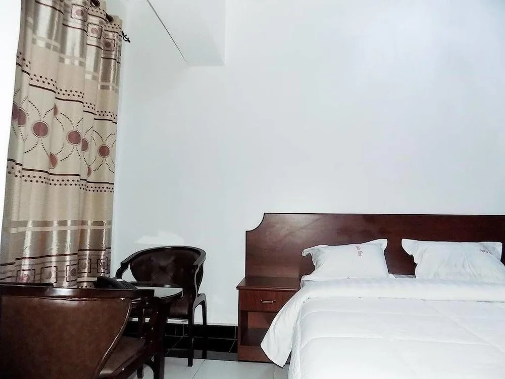 Sunrise Hotel - Chambres