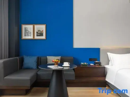 Kunlong Hotel - Chambres