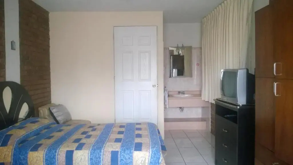 Mariana's Petit Hotel - Chambres