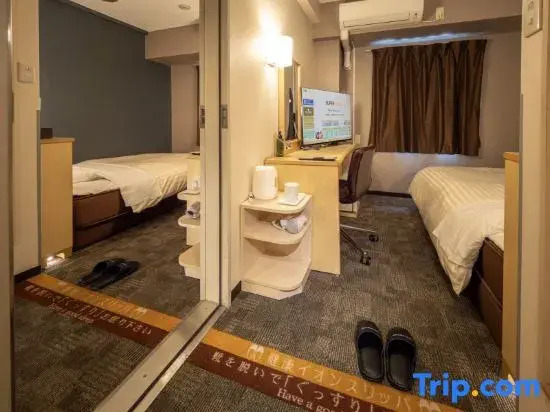 Двухместный семейный номер Standard 2 отдельные кровати в Natural Hot Springs Spa Hotel Hananoi Osaka