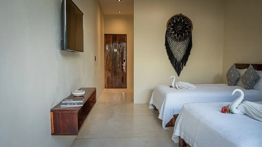 Deluxe Quadruple room with balcony