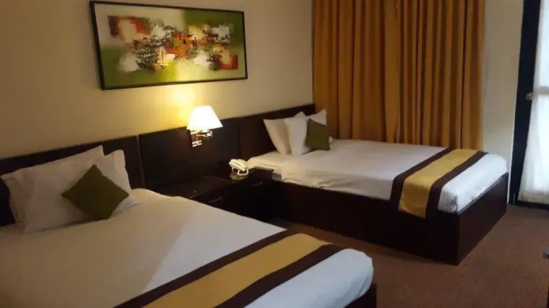 Grand Tembaga Hotel - Chambres