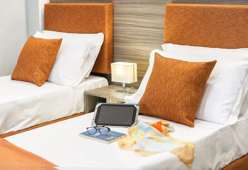 Deluxe Quadruple room with balcony