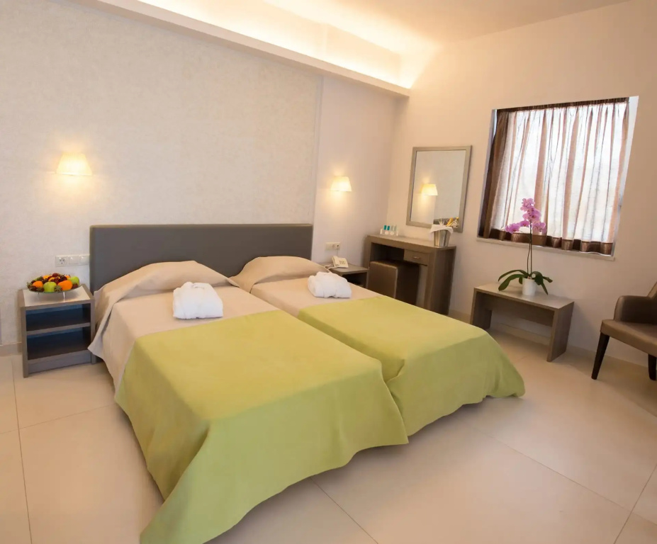 Astron Hotel - Chambres
