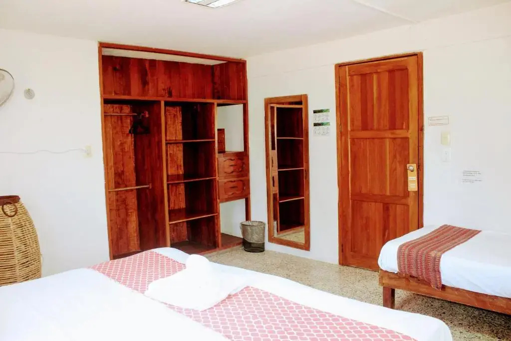 Hostal & Suites Pata de Perro - Chambres