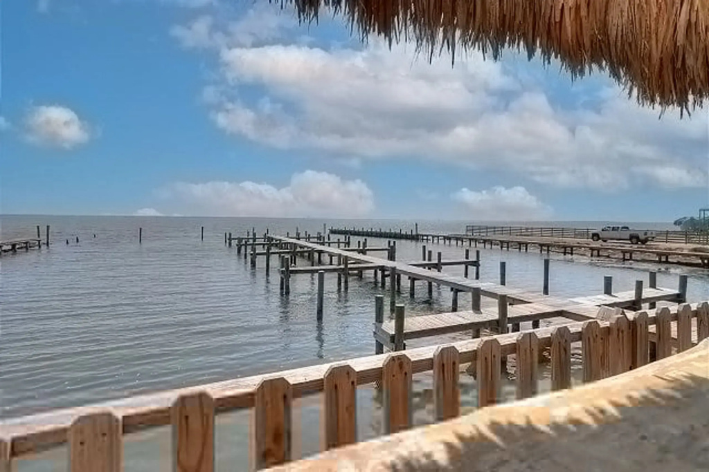 Waterfront Escape w/ Views Shared Pool & Boat Dock Orange Crush by Avantstay