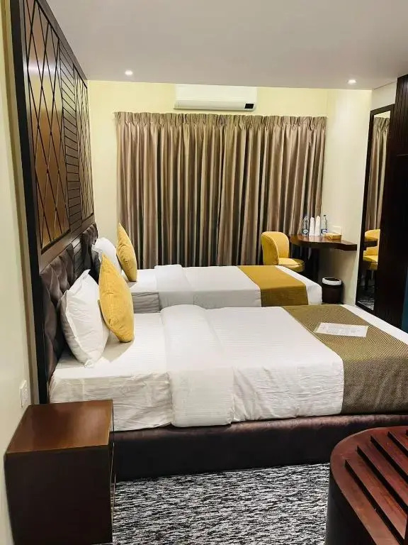 Richmond Hotel & Apartments - Chambres