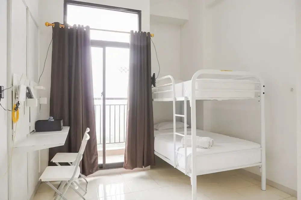 Homey and Cozy Living Studio Room at Dave Apartment