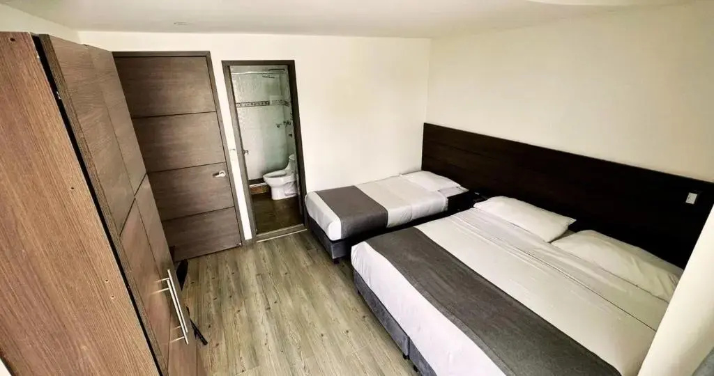 Expo Hotel Ferial - Chambres