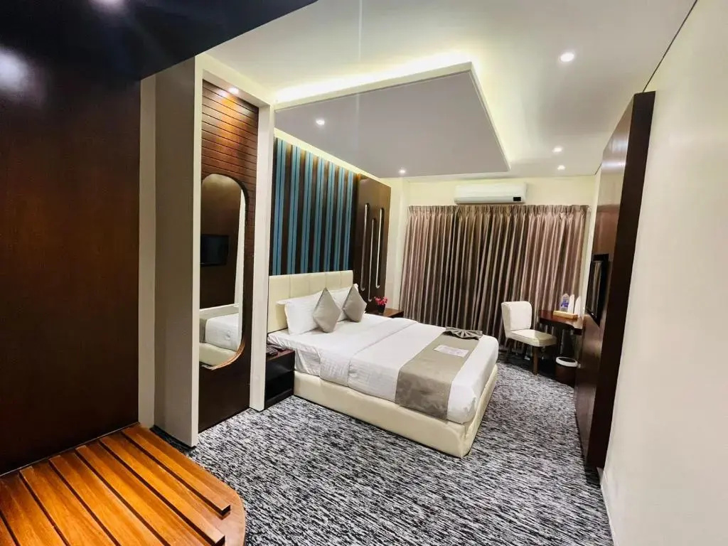 Richmond Hotel & Apartments - Chambres