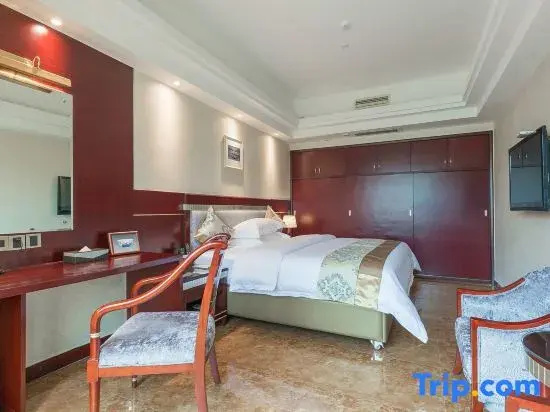 Yi Long Hotel - Chambres
