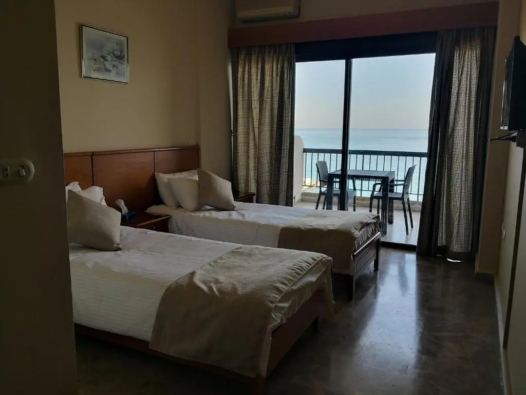 Holiday Suites Hotel And Beach - Chambres