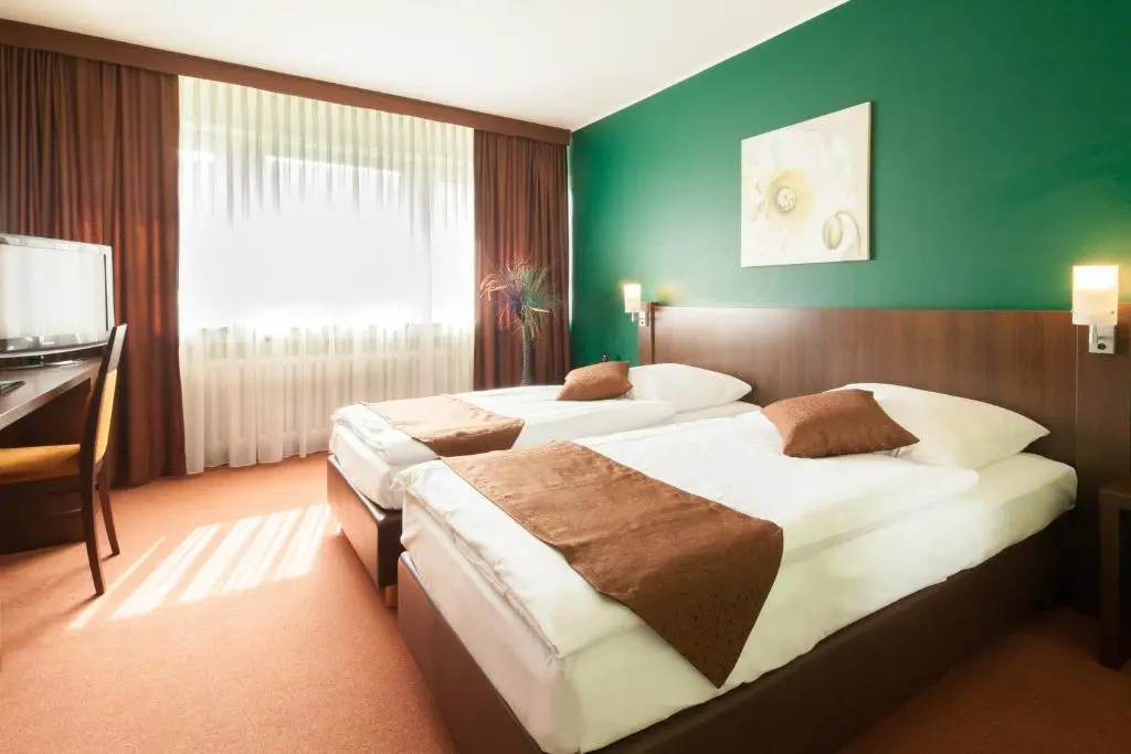 Hotel Mondial - Chambres