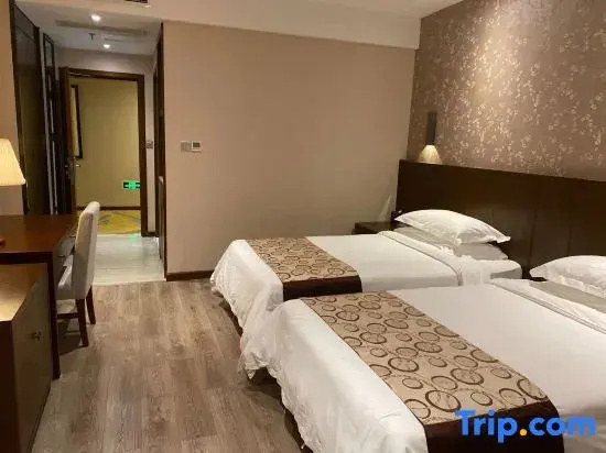 Xinhua Hotel - Chambres