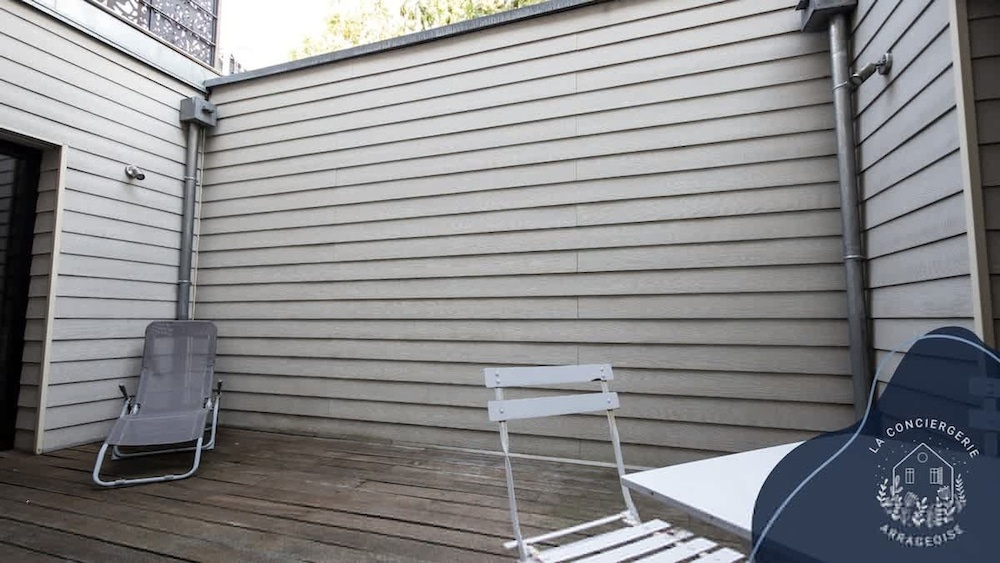 Voir la photo 4 — La Terrasse Proche des Places 2 Chambres
