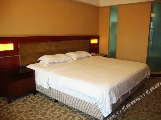 Huaweida Hotel - Chambres