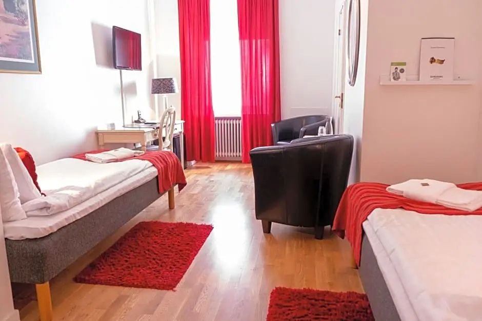Stadshotellet Kristianstad - Chambres