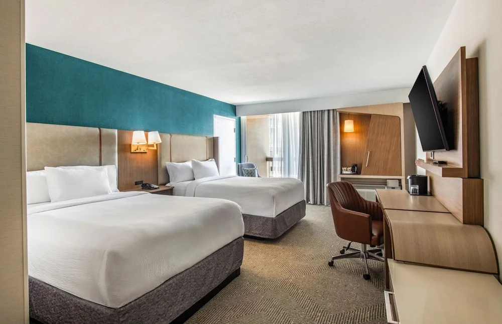 Standard Quadruple room with courtyard view