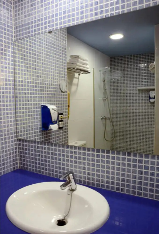 Standard Triple room with balcony