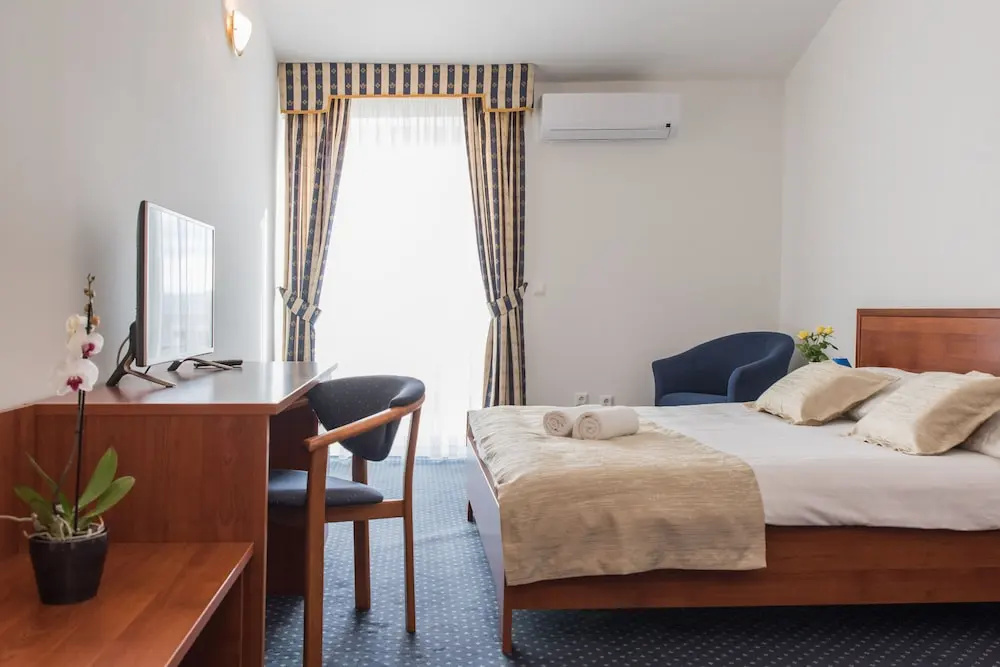 Superior Triple room with balcony and with sea view