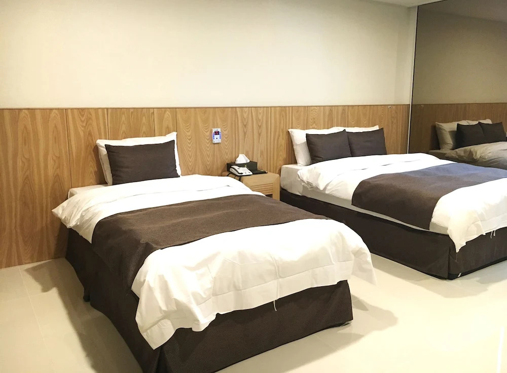 K Tourist Hotel - Chambres