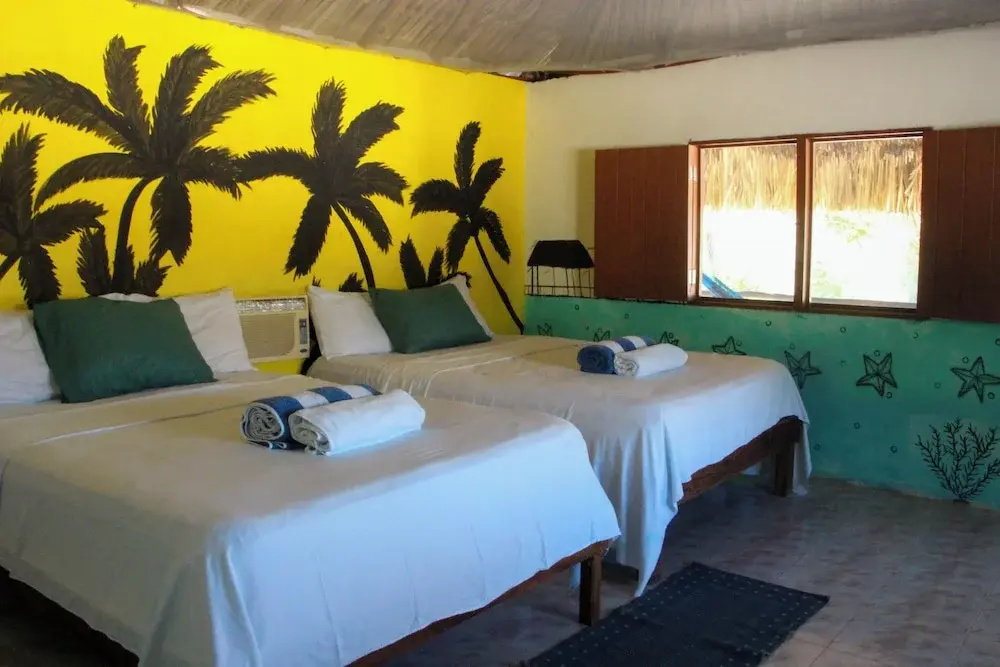 Standard Quadruple room with partial sea view