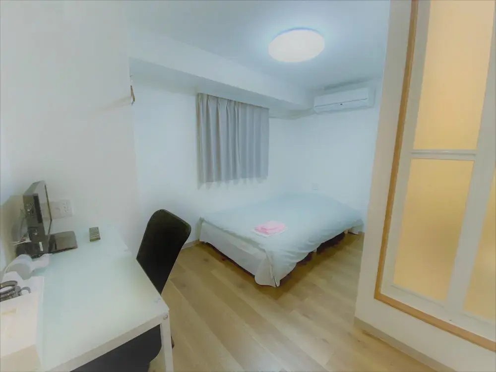 Hotel Chuo Bridge - Chambres