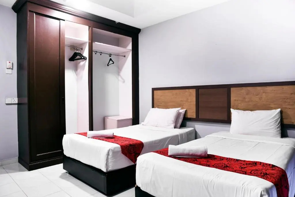 Leisure Cove Hotel & Apartments - Chambres