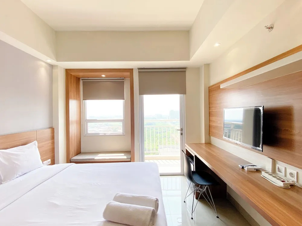 Minimalist And Homey Studio Apartment At Mustika Golf Residence