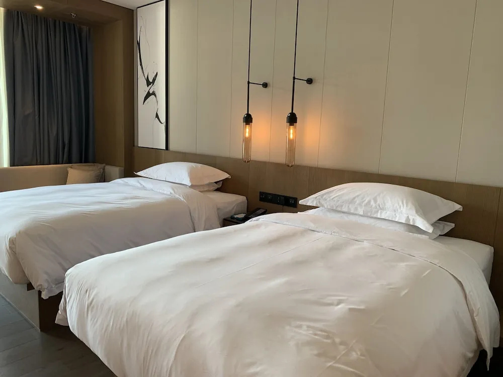 Standard Quadruple room with courtyard view