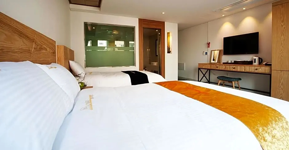 A-One Hotel - Chambres
