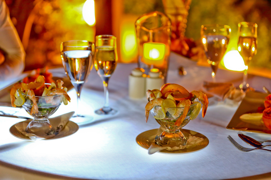 Charmillion Club Resort: A buffet-style serving station with food displays and beverage containers.