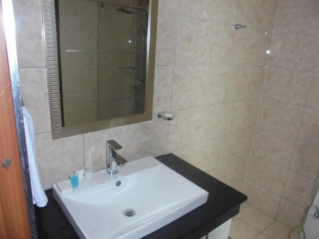 WE Hotel and Suites - Chambres