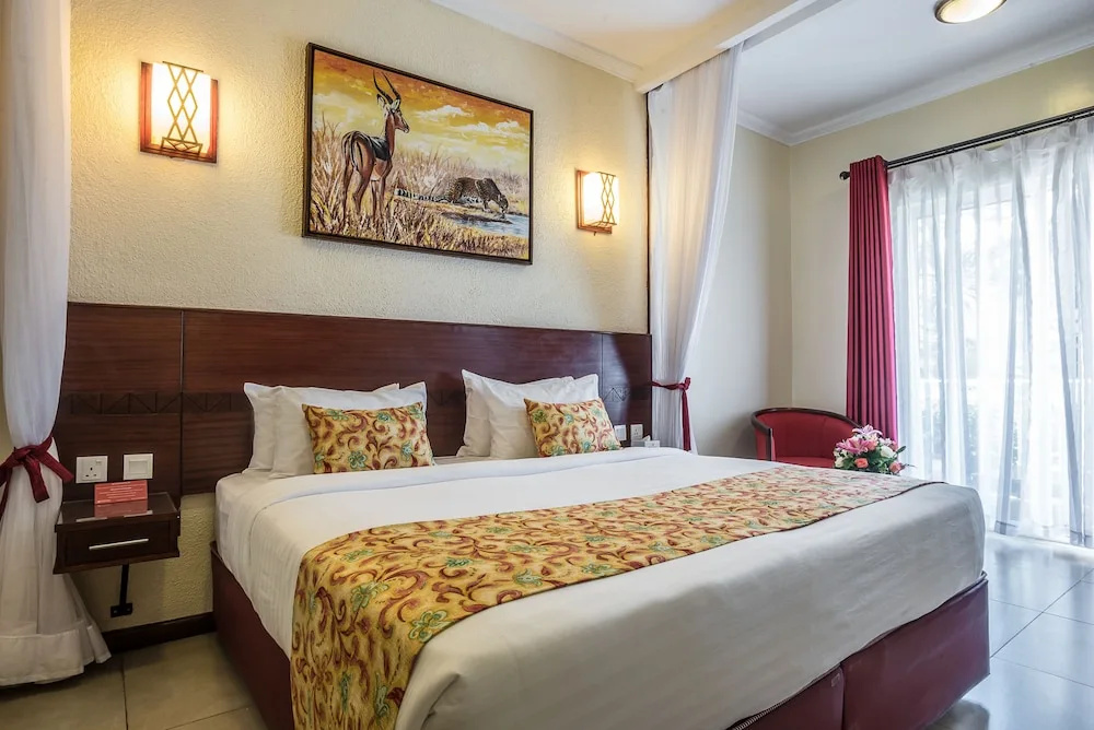 PrideInn Hotel Raphta - Chambres