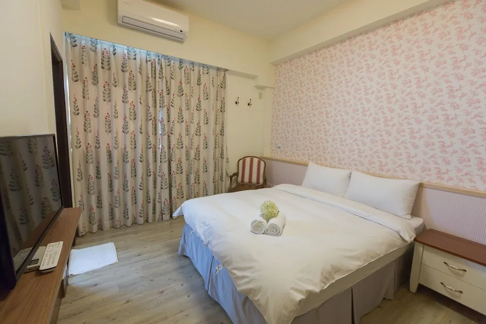 Xiang Xiang Hotel - Chambres